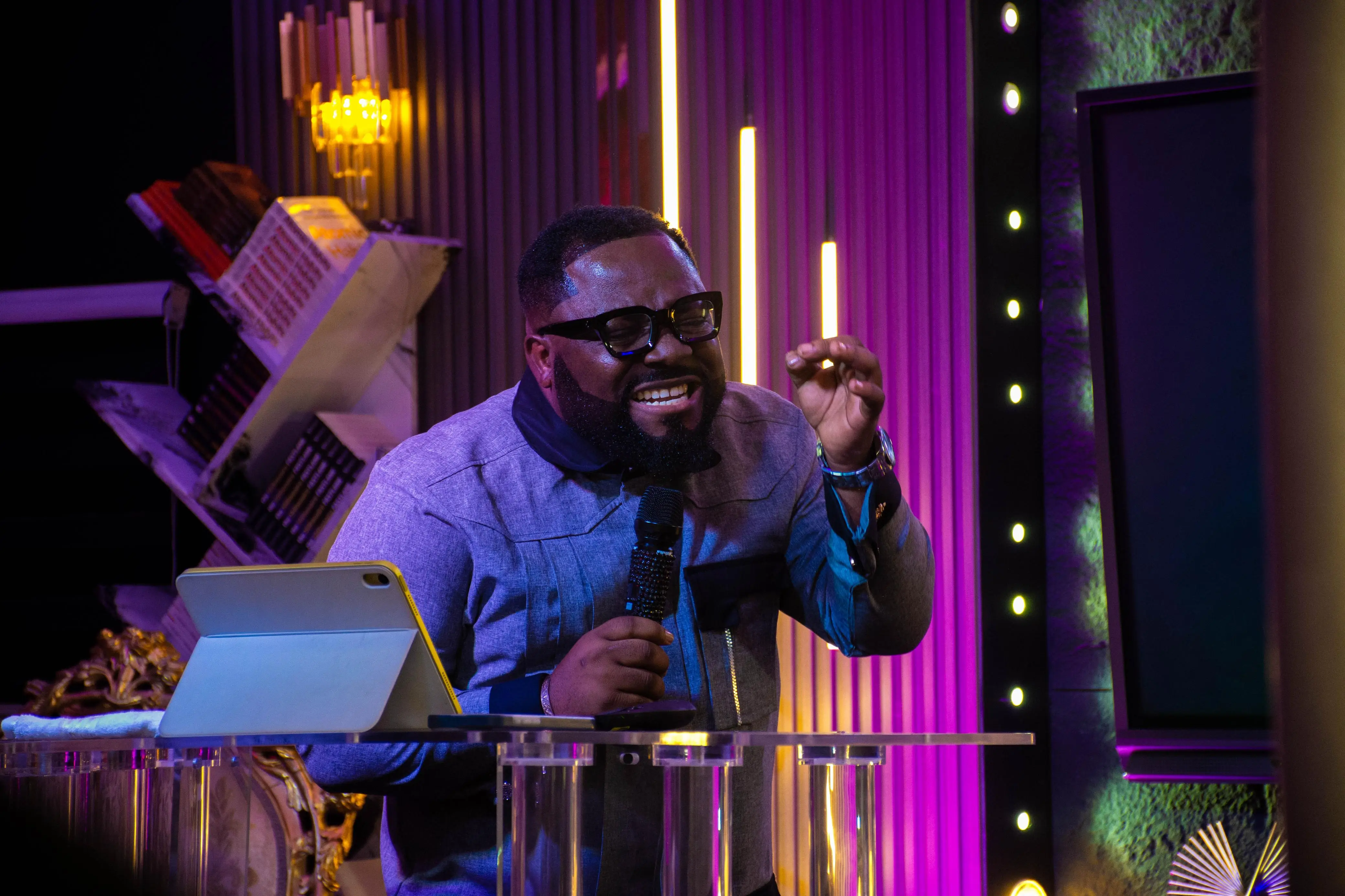 Congregation with hands raised in worship